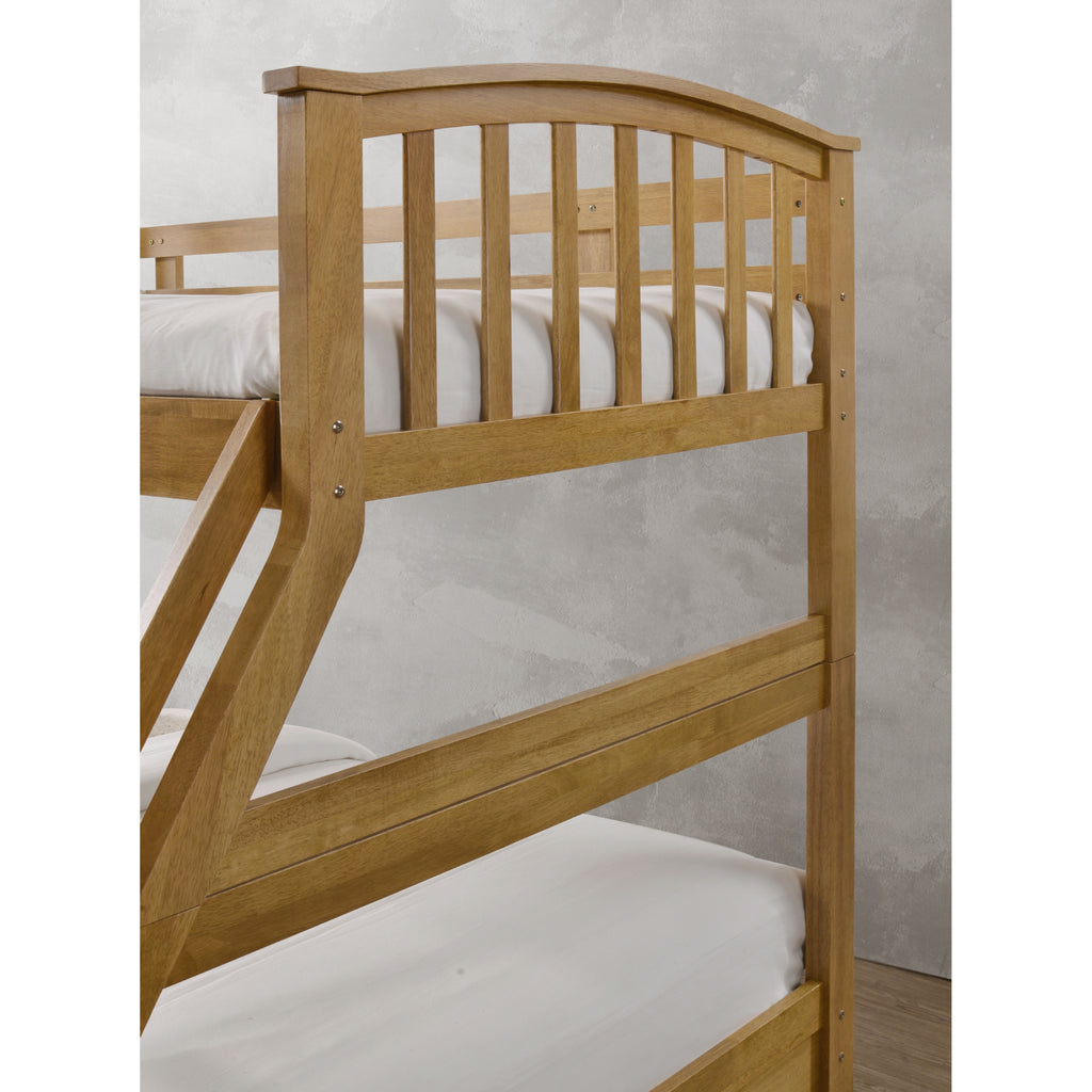 Torsha Rubberwood Stacking Triple Sleeper with Underbed Drawers in oak in furnished room, curved headboard detail