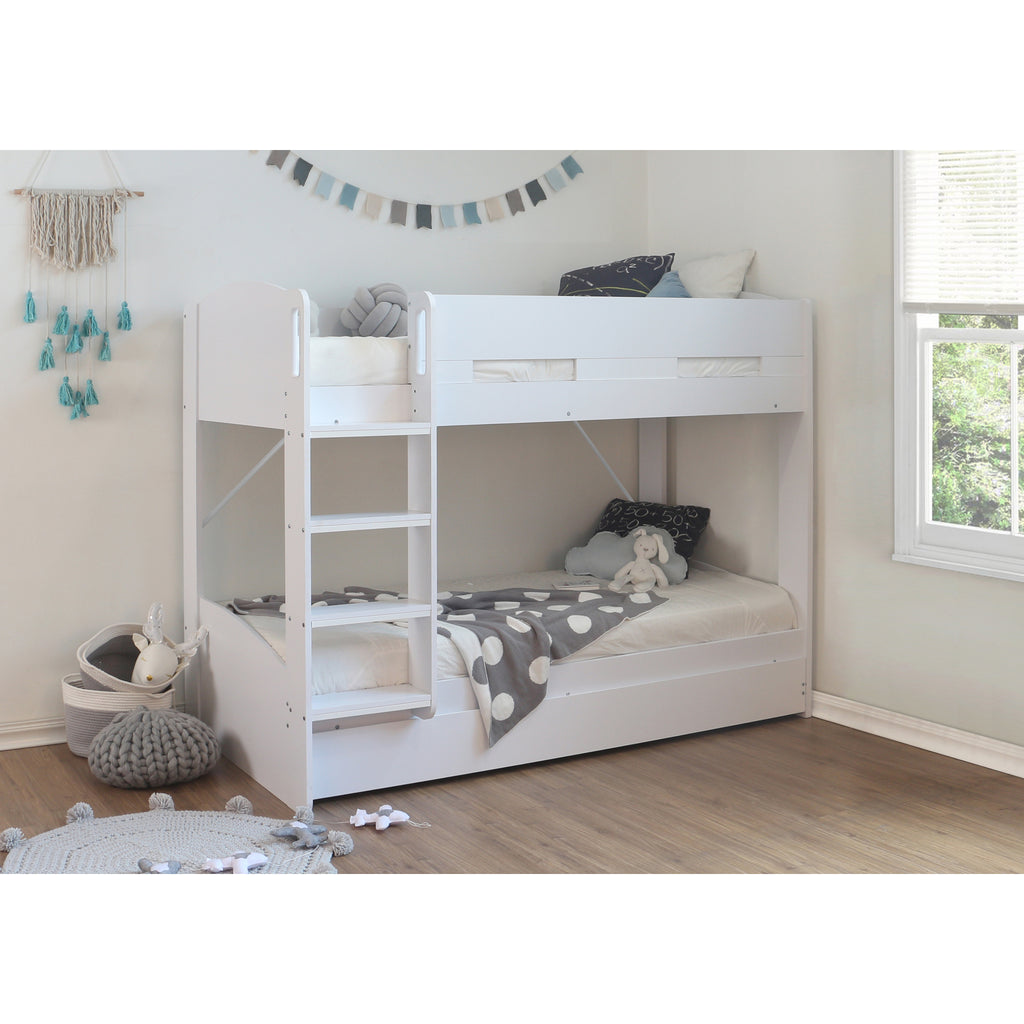 Billie Bunk Bed with Trundle in white in furnished room, trundle closed