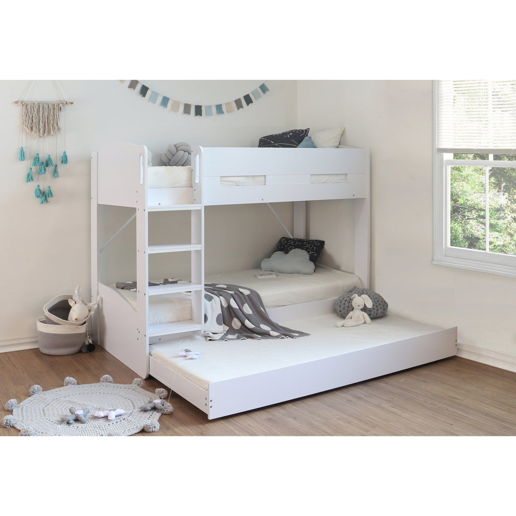 Billie Bunk Bed with Trundle in white in furnished room, trundle extended