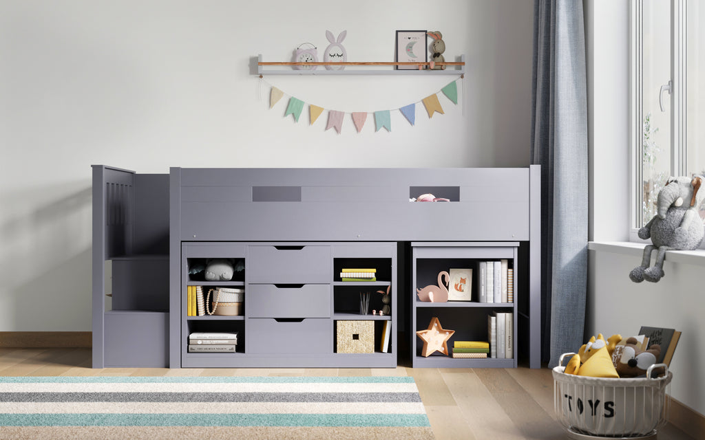 Charlie Mid Sleeper Bed with Desk & Storage in grey. In furnished room, side view showing drawers and shelves.