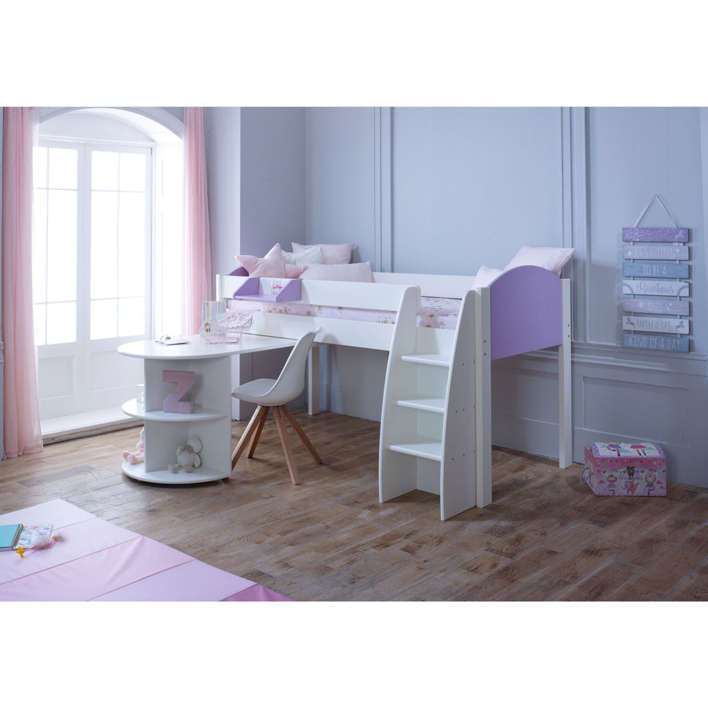 Eli Midsleeper with Pullout Desk set up in white and lilac in a furnished child's bedroom