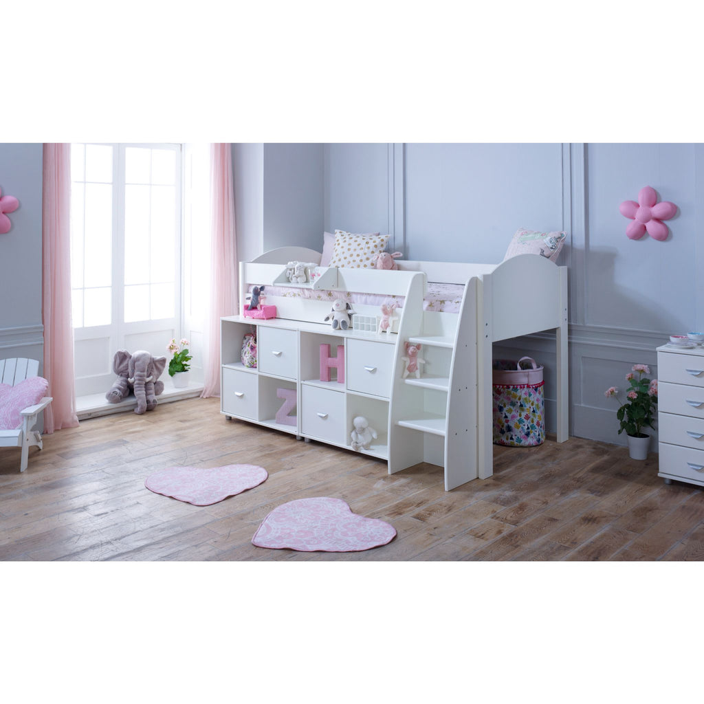 Eli Midsleeper with 2 cube units in all white in a furnished room. The cube units are slightly pulled out from under the bed to provide an additional shelf.