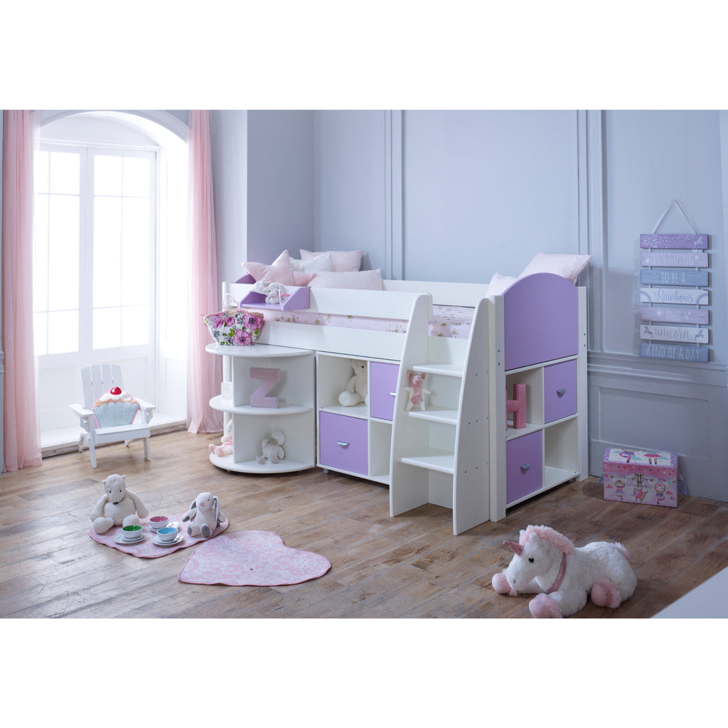 Eli Midsleeper with retracted Pullout Desk and two Cube Units in white and lilac in a furnished bedroom.