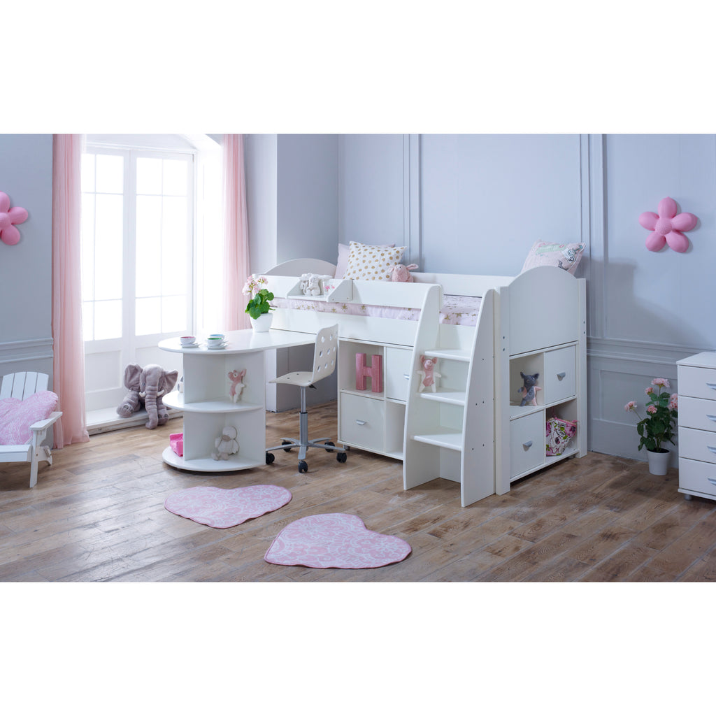 Eli Midsleeper with rPullout Desk and two Cube Units in wall white in a furnished bedroom.