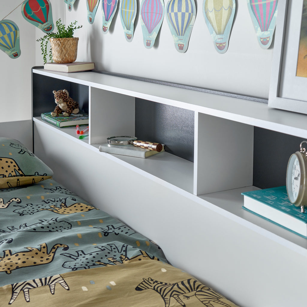Oilver Solid Wood Bunk Bed in grey & white in furnished room, top bunk shelving detail