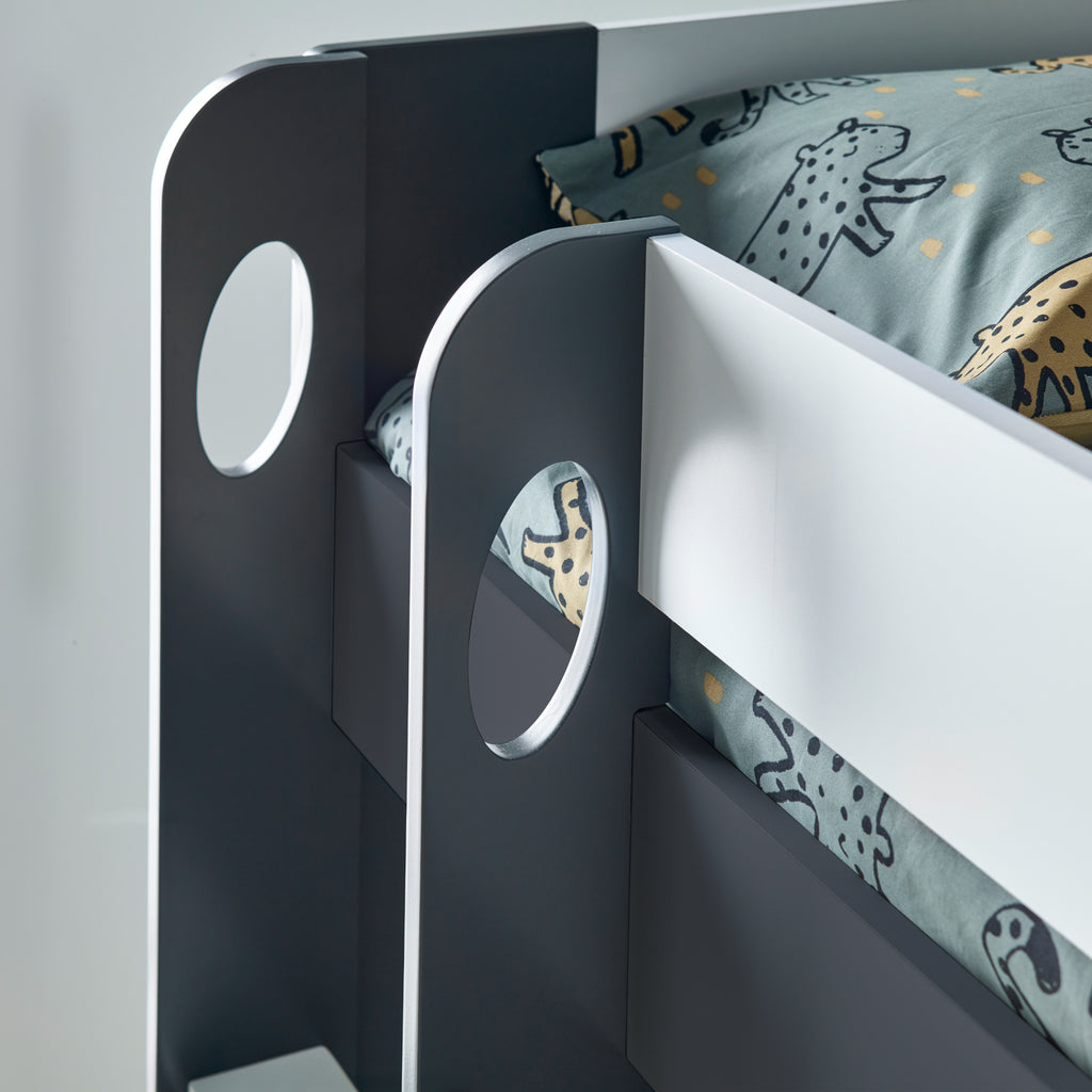 Oilver Solid Wood Bunk Bed in grey & white in furnished room, top of ladder handles, close up detail