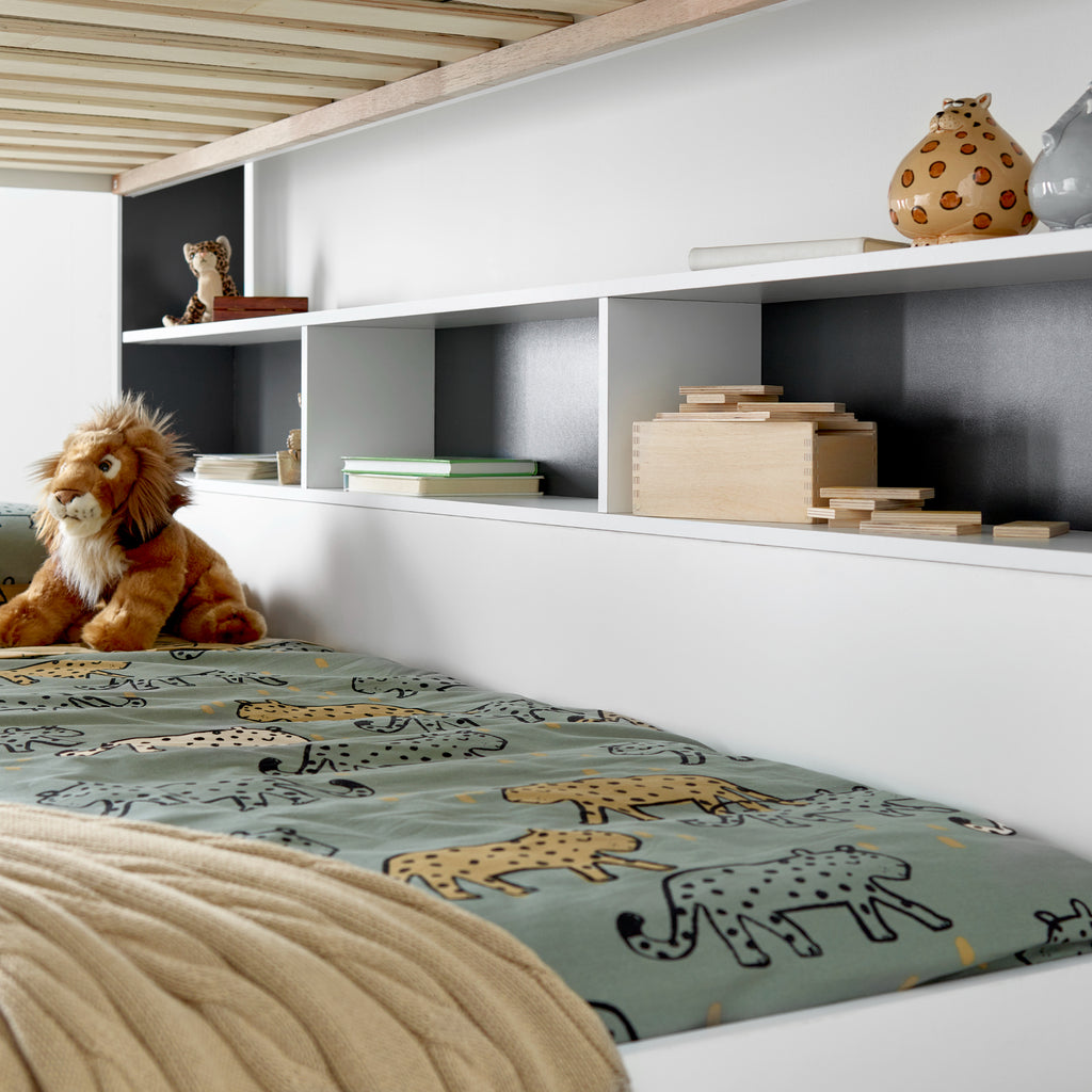 Oilver Solid Wood Bunk Bed in grey & white in furnished room, bottom bunk shelving detail