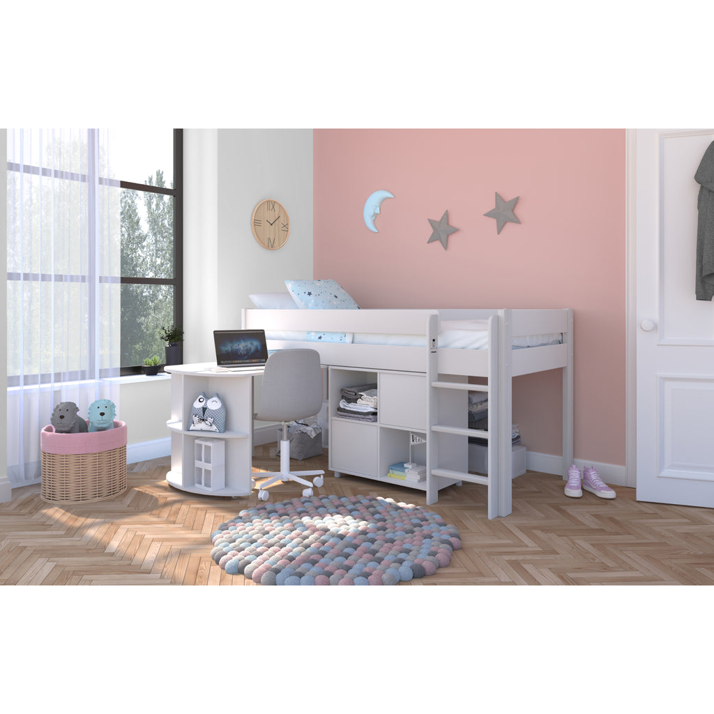 Stompa Uno Midsleeper with Pull-Out Desk & Cube Storage Unit in white in furnished room, wide shot