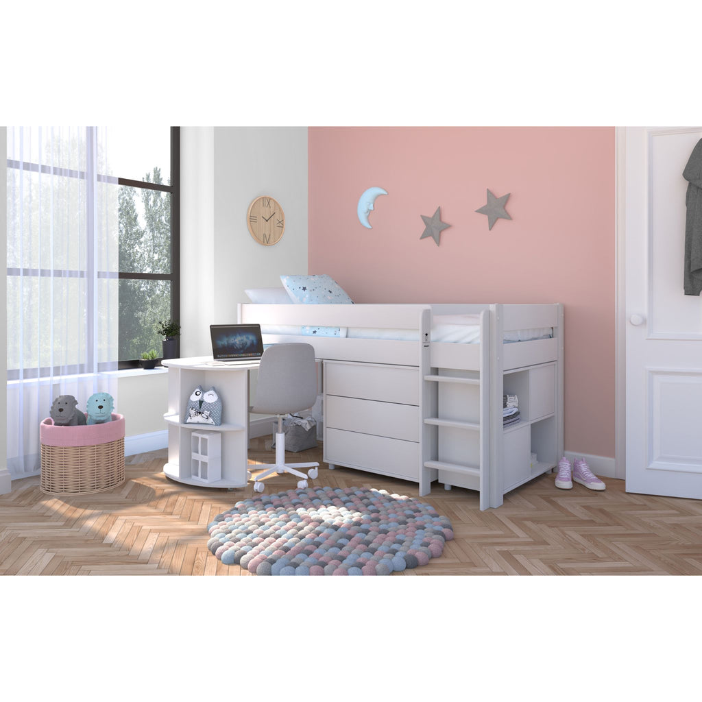 Stompa Uno Midsleeper with Pull-Out Desk, Cube Storage Unit & 3 Drawer Chest on white in furnished room, wide shot