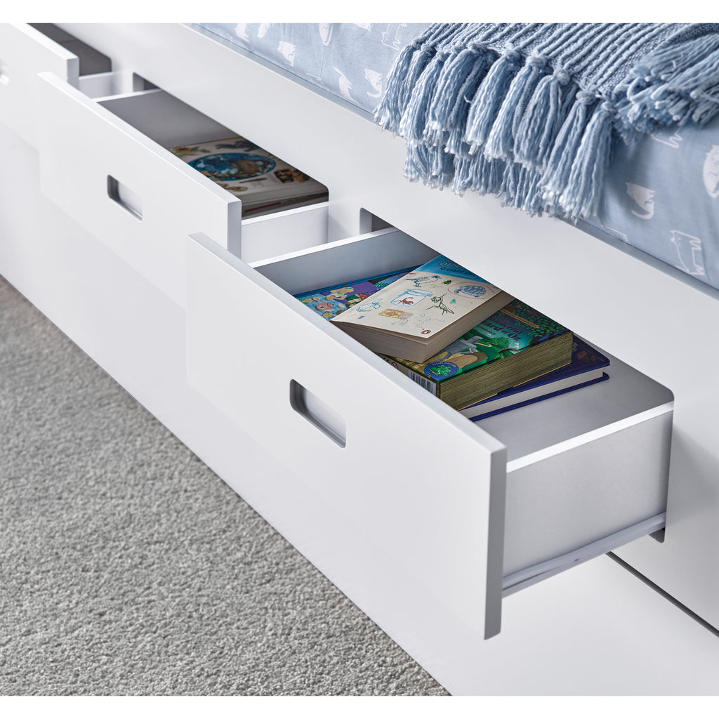 Veera Guest Bed & Trundle in white in furnished room, open drawers detail