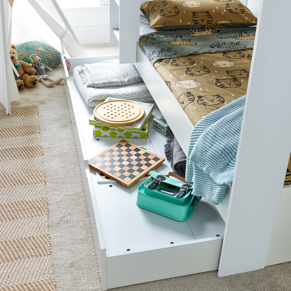 Oilver Solid Wood Bunk Bed in white in furnished room, underbed drawer close up detail